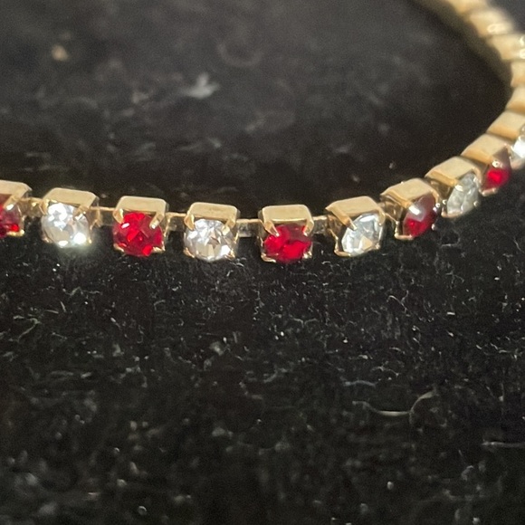 7.5” gold plated tennis bracelet with 38 prong set red and clear crystals - Picture 2 of 15